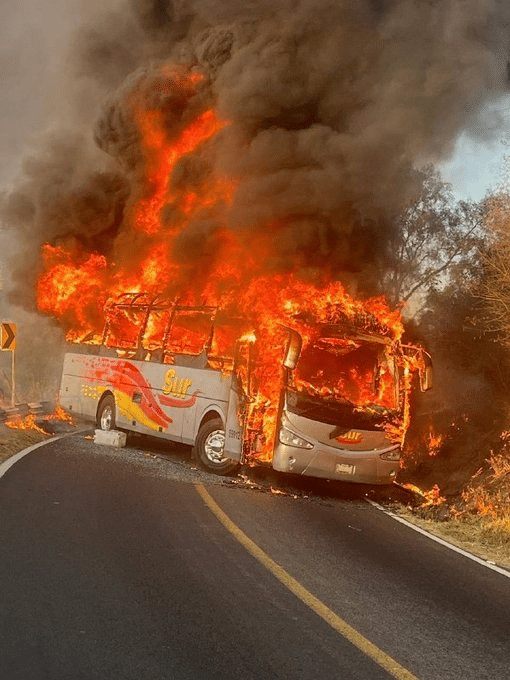 Bus set on fire by CJNG cartel members in retaliation after El Mencho death February 2026 Mexico